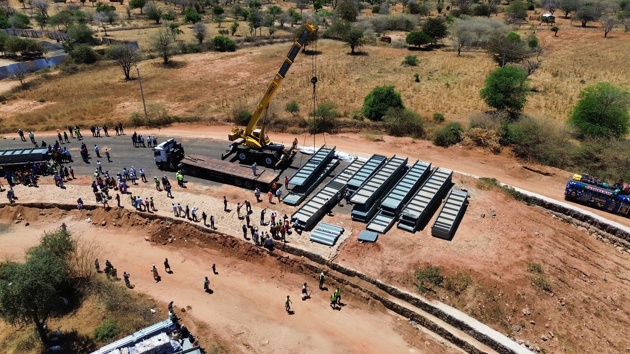 An aerial view of metal girders at the Enziu Bridge Construction site.
