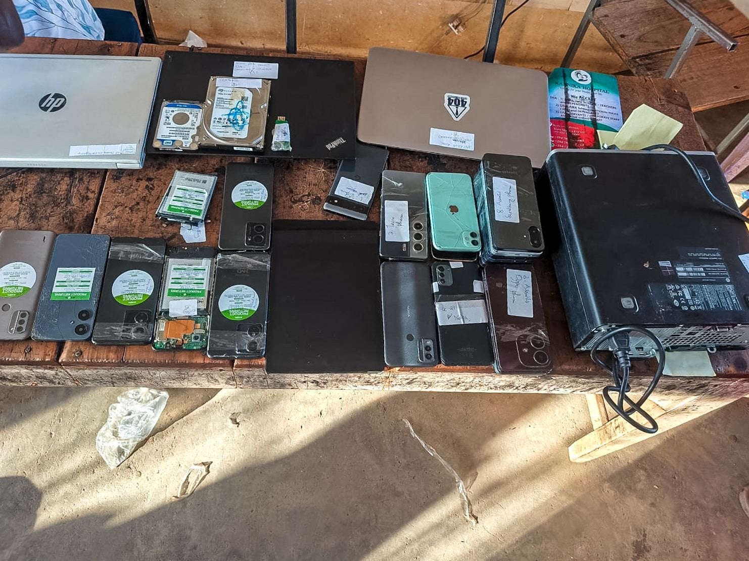 A file photo of the devices recovered from a phone theft and hacking syndicate.