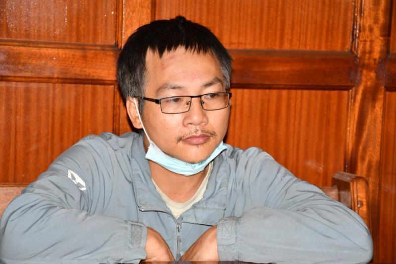 A file photo of the Chinese National wanted in Uganda in connection with fraud.