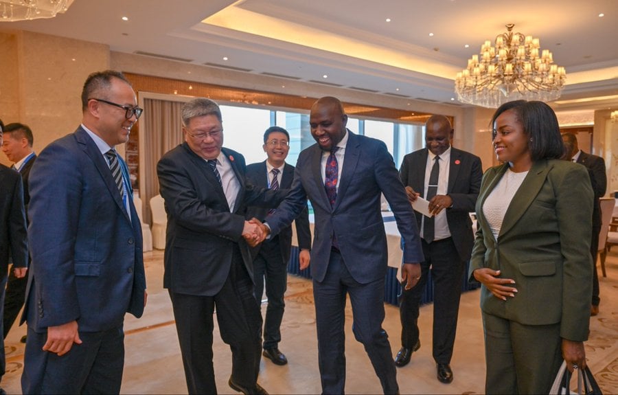 A file photo of CS Kipchumba Murkomen with Vice Minister for Public Security Qi Yanjun.
