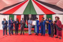 File image of President William Ruto awarding a Letter of Interim Authority to Kamagambo University