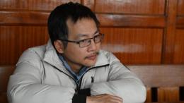 File image of Chinese National, Chen Guang, wanted in Uganda in connection with fraud