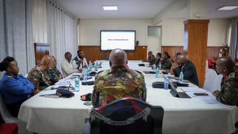 File image of the meeting between KDF and WHO